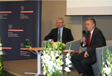 Two participants sitting at the table